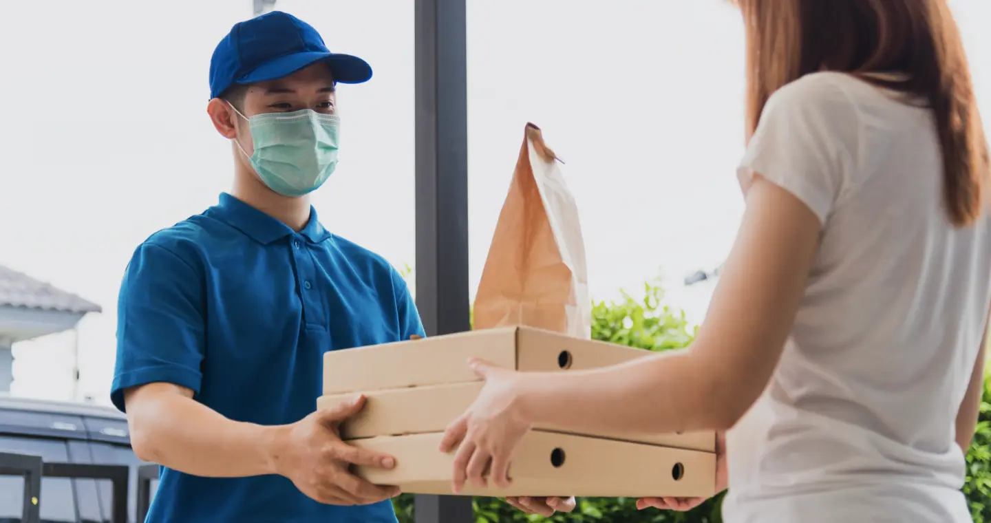 Volunteers delivering boxes of food